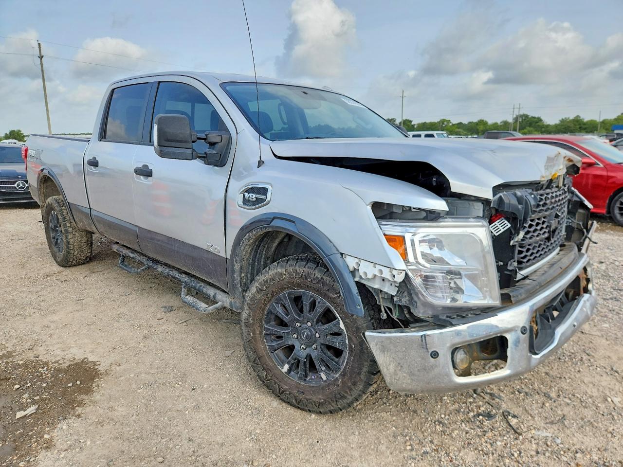 1N6AA1F44KN527950 · 2019 NISSAN TITAN XD · 4/13