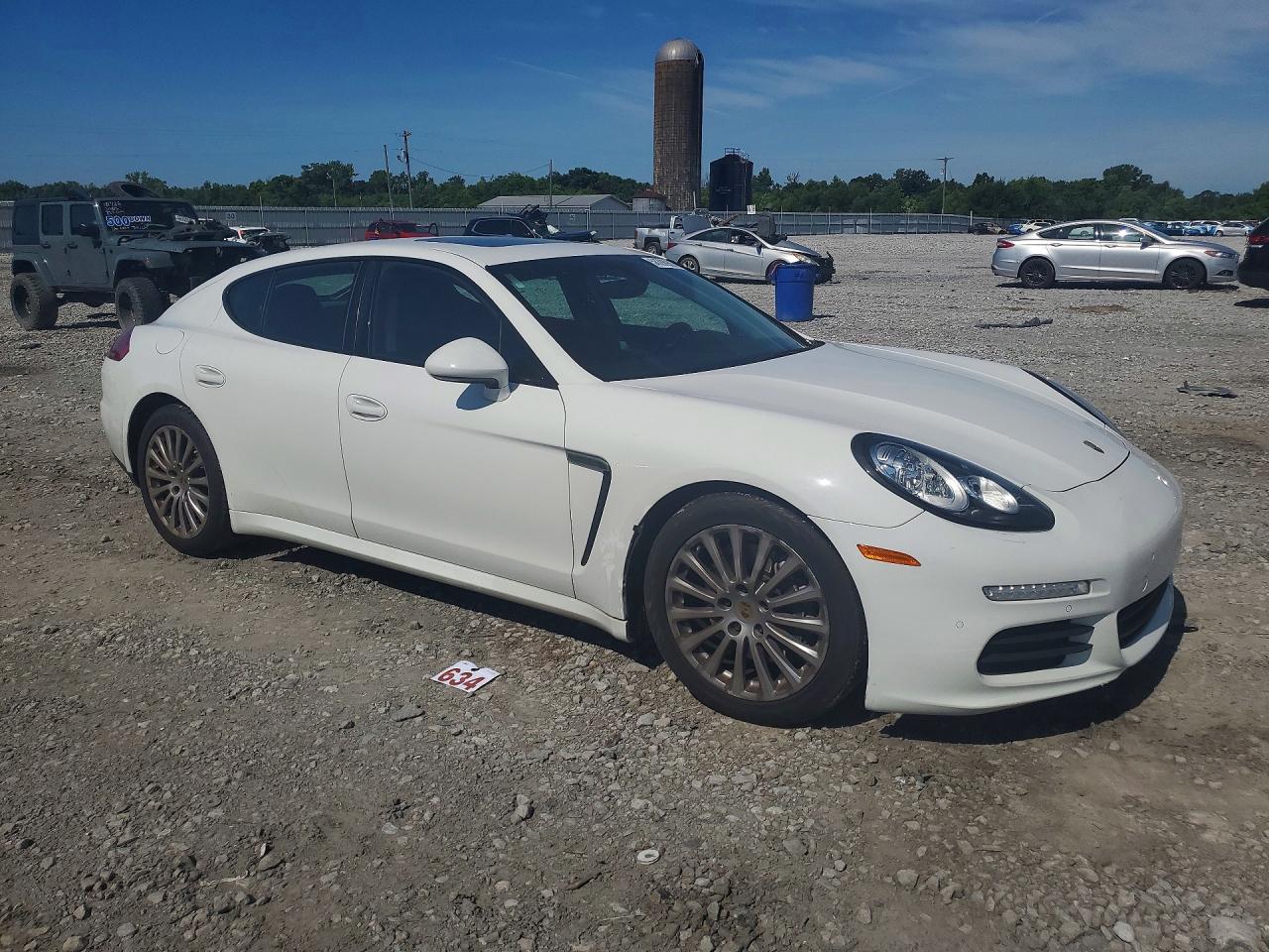 WP0AA2A72GL002995 · 2016 PORSCHE PANAMERA · 4/13