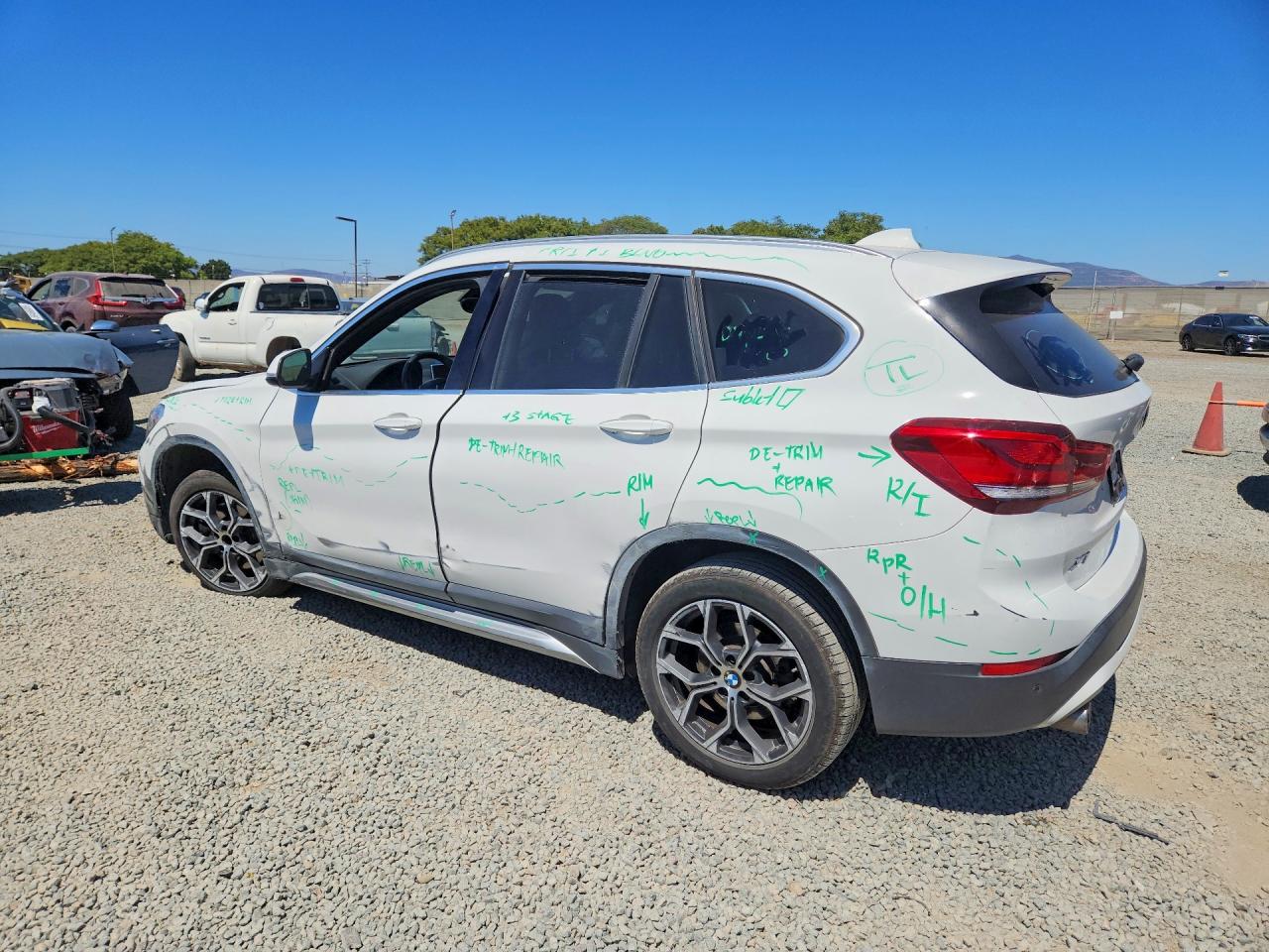 WBXJG7C02L5P75141 · 2020 BMW X1 · 2/13