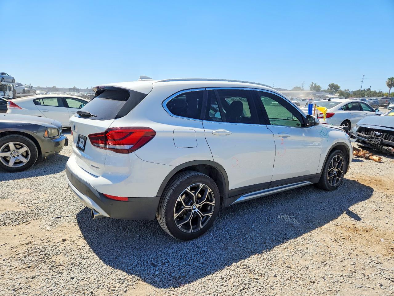 WBXJG7C02L5P75141 · 2020 BMW X1 · 3/13