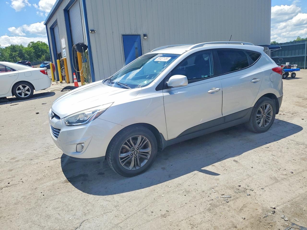 KM8JUCAGXEU878665 · 2014 HYUNDAI TUCSON