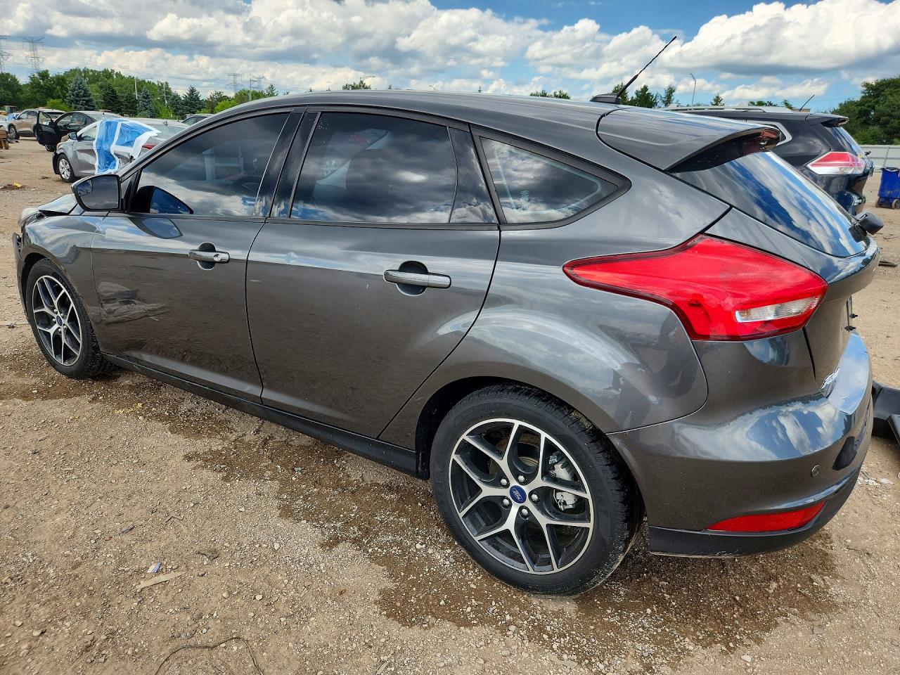1FADP3M20JL221288 · 2018 FORD FOCUS · 2/12