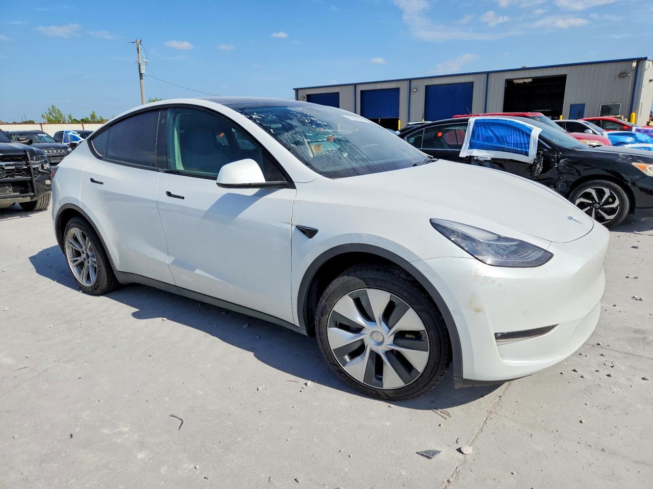 7SAYGAEE4NF570202 · 2022 TESLA MODEL  Y · 4/13