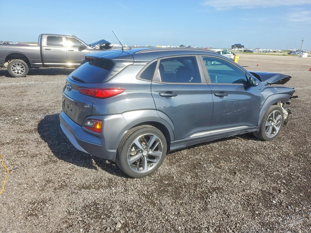KM8K33A51JU099817 · 2018 HYUNDAI KONA · 3/13