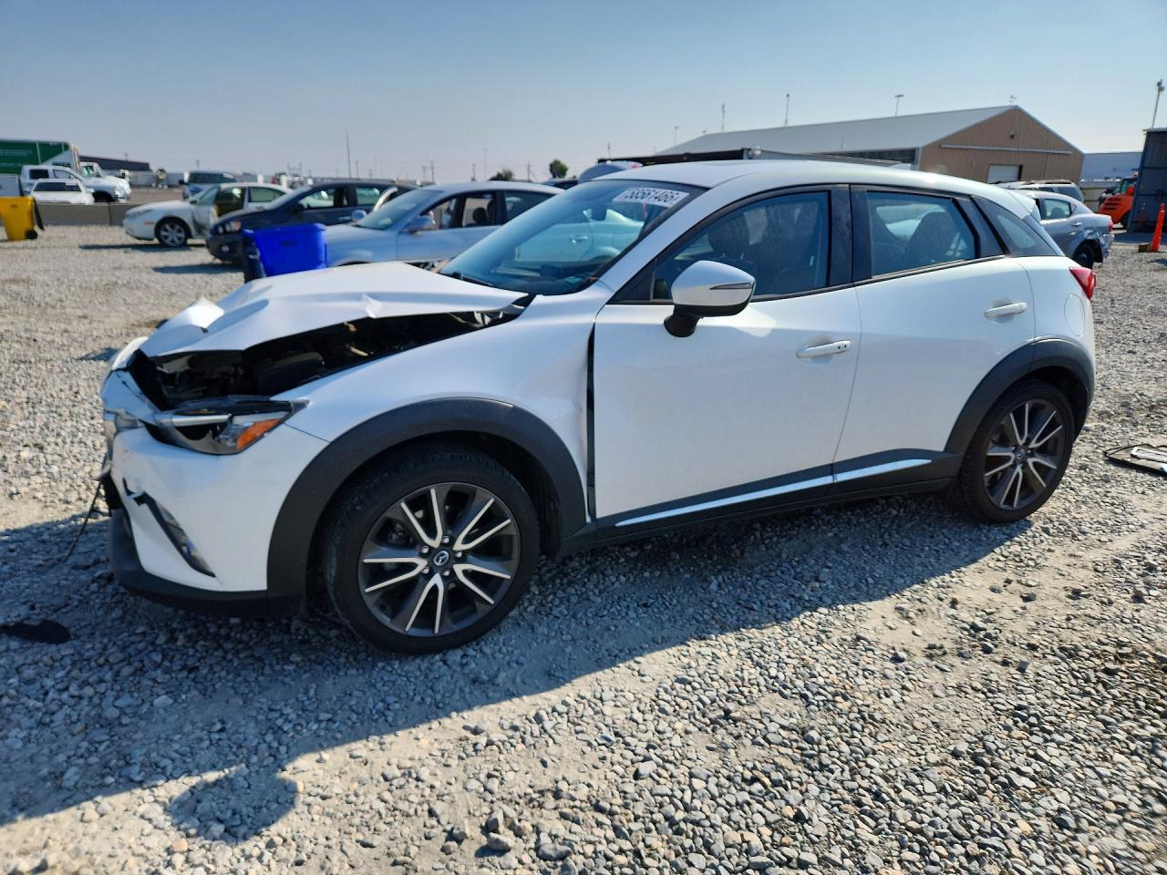 JM1DKBD72G0117572 · 2016 MAZDA CX-3