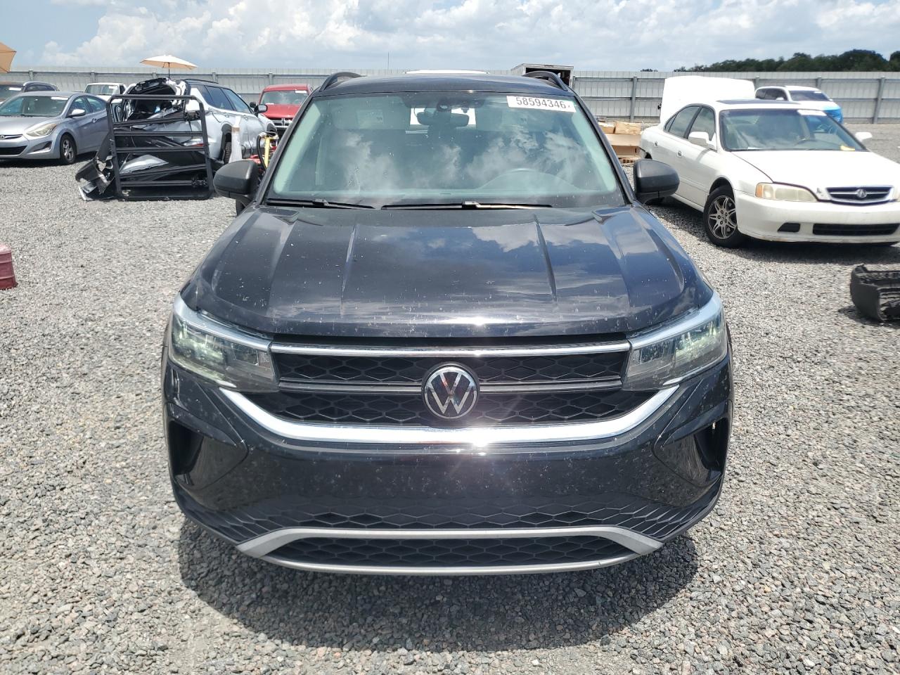 3VVCX7B21PM366560 · 2023 VOLKSWAGEN TAOS · 5/14