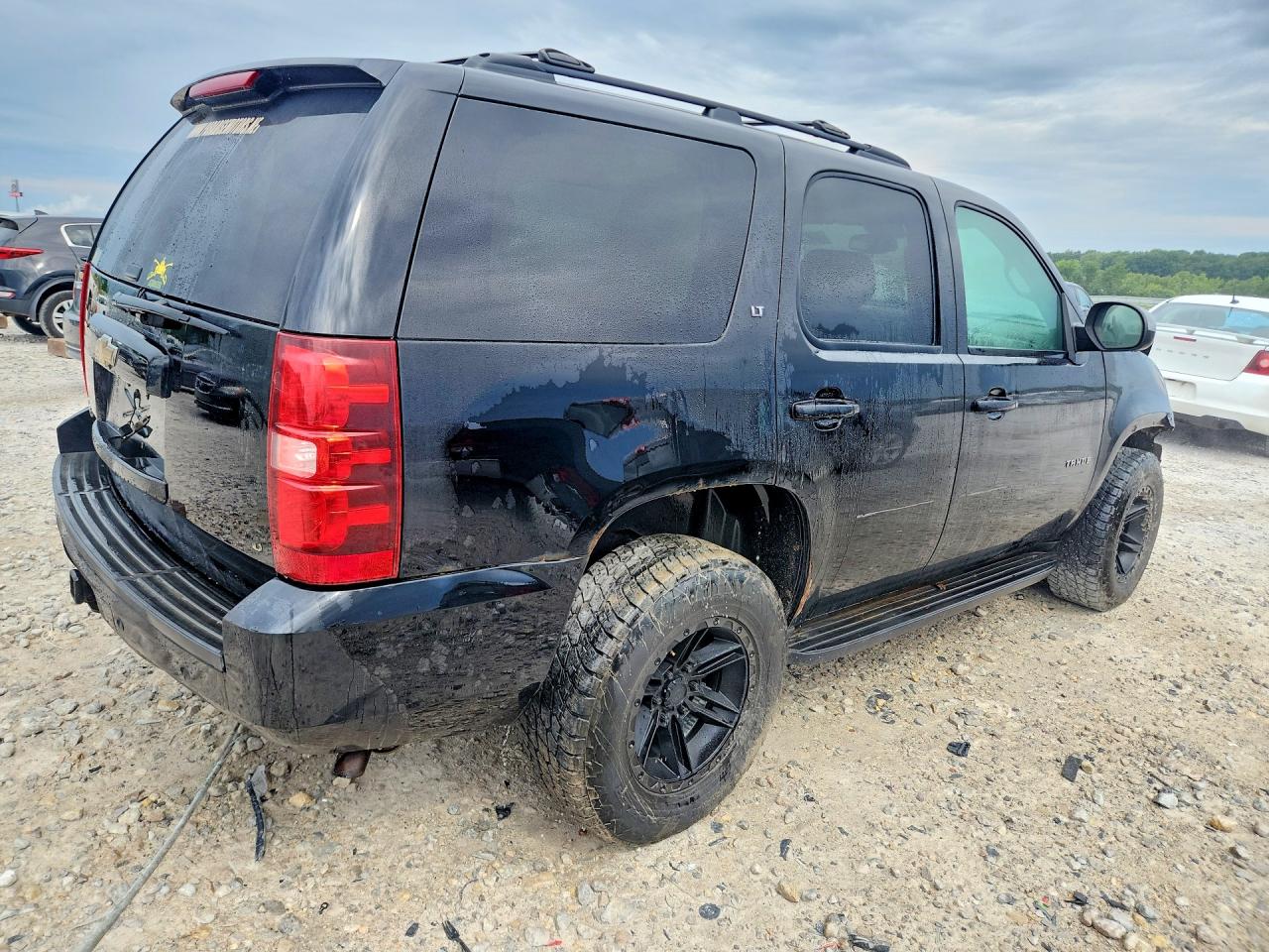 1GNSKBE05BR255417 · 2011 CHEVROLET TAHOE · 3/13