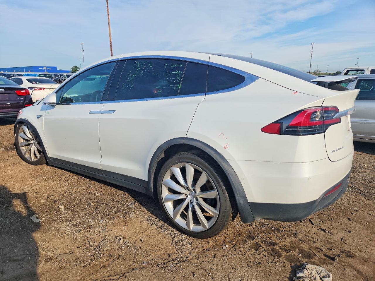 5YJXCBE2XGF014527 · 2016 TESLA MODEL X · 2/12