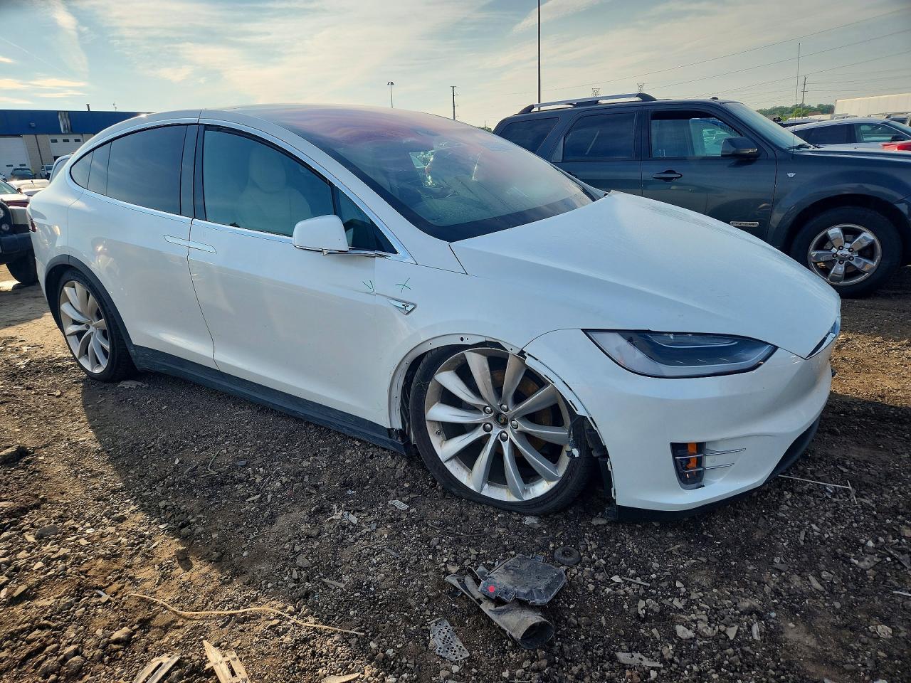 5YJXCBE2XGF014527 · 2016 TESLA MODEL X · 4/12