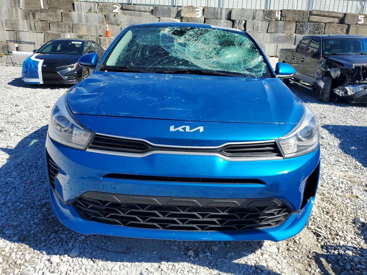 3KPA24AD9NE490668 · 2022 KIA RIO · 5/13