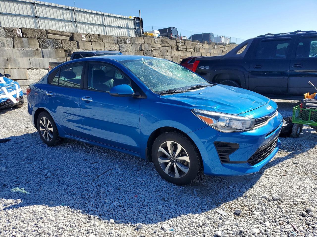 3KPA24AD9NE490668 · 2022 KIA RIO · 4/13