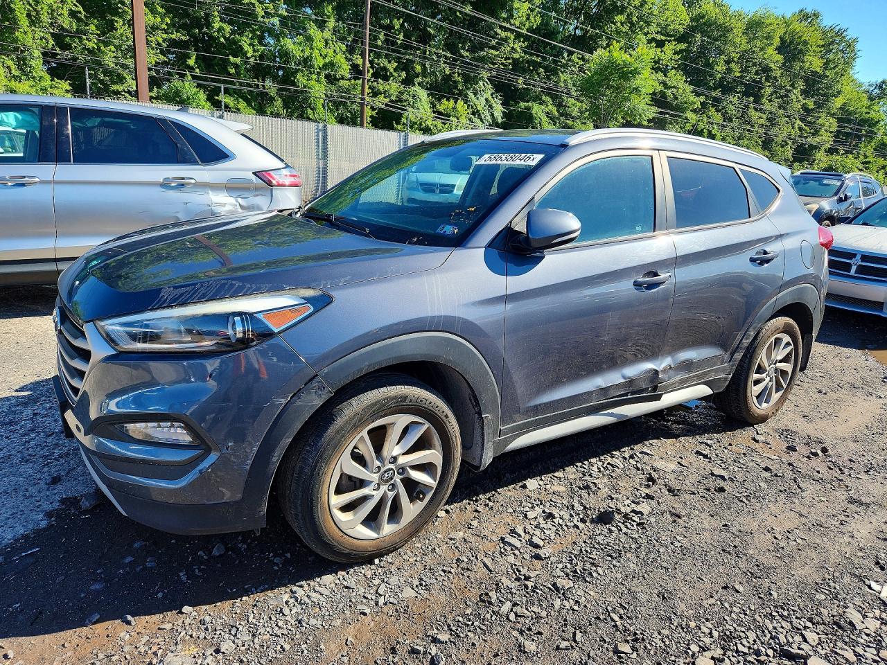 KM8J3CA23HU387012 · 2017 HYUNDAI TUCSON