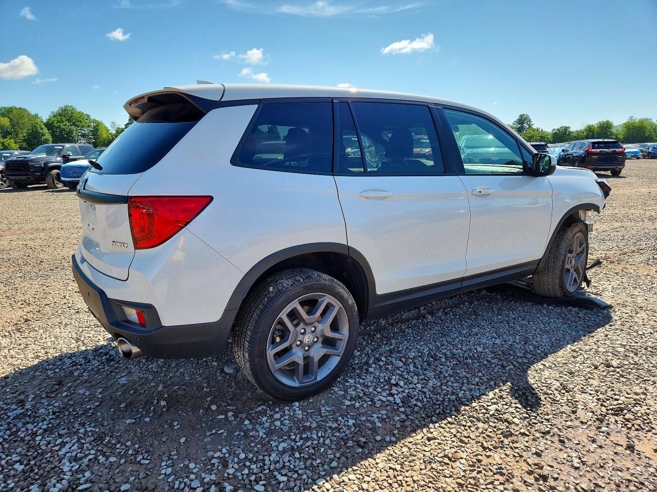 5FNYF8H57PB002758 · 2023 HONDA PASSPORT · 3/13