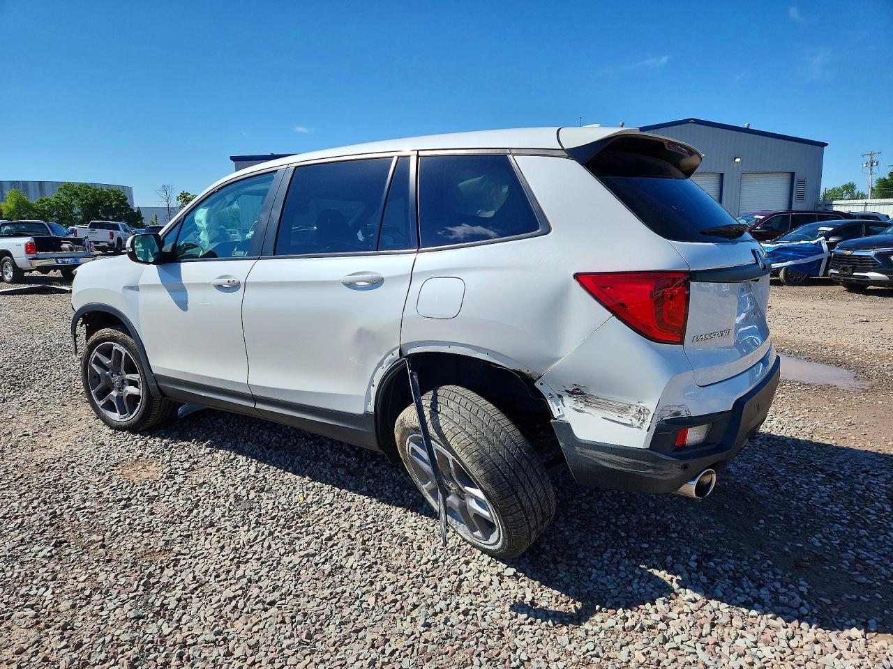 5FNYF8H57PB002758 · 2023 HONDA PASSPORT · 2/13