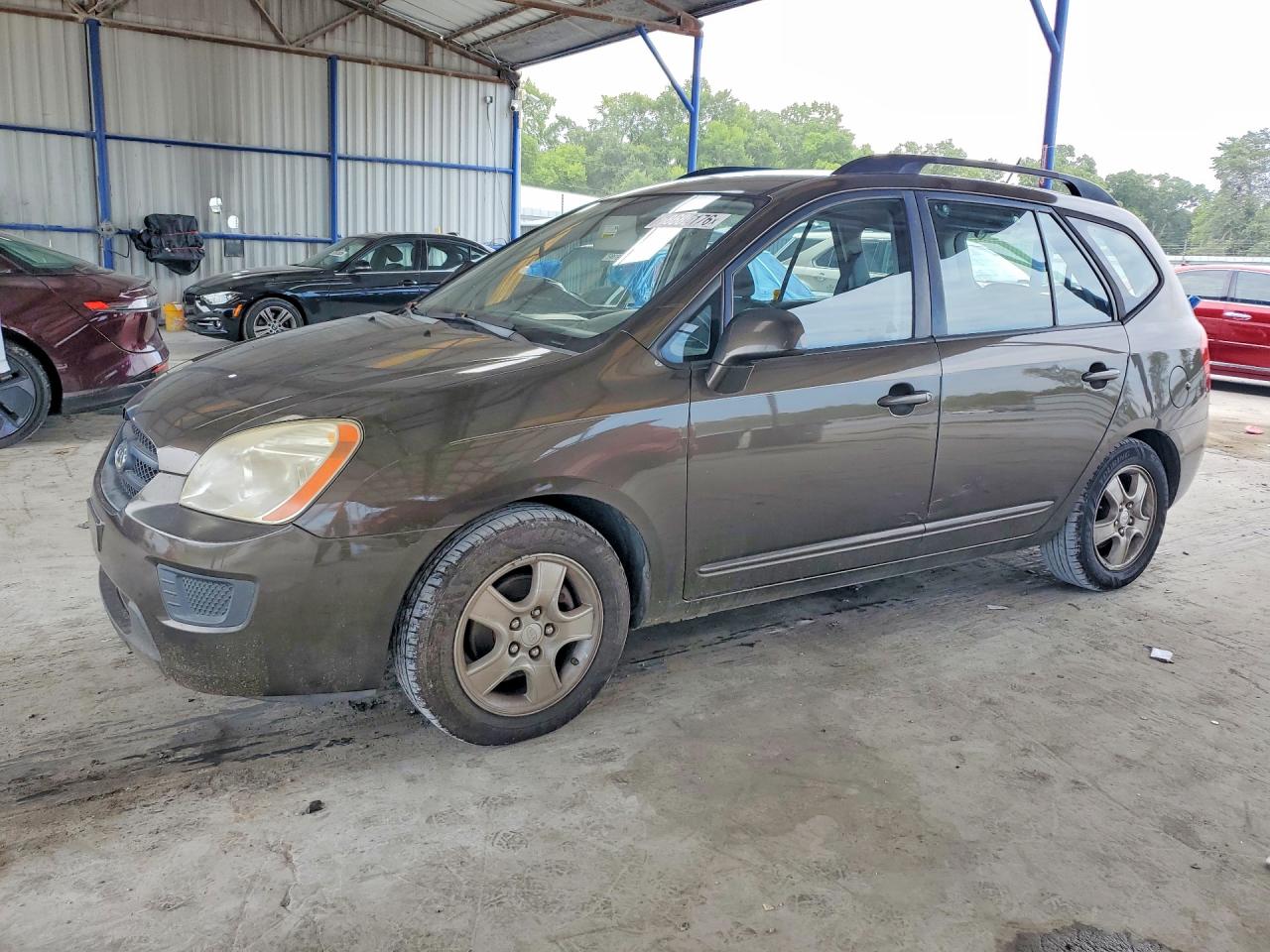 KNAFG528997264597 · 2009 KIA RONDO