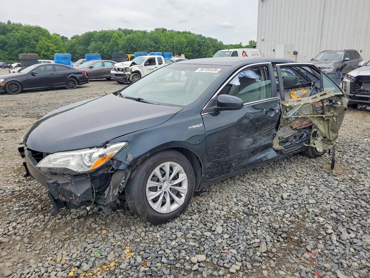 4T1BD1FK4FU143302 · 2015 TOYOTA CAMRY HYBRID