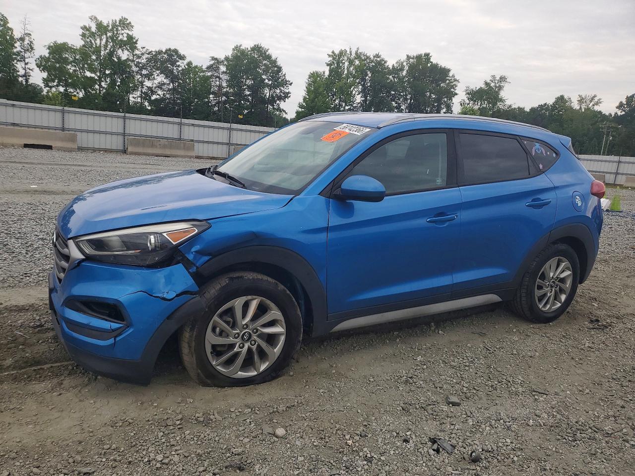 KM8J3CA44JU729977 · 2018 HYUNDAI TUCSON