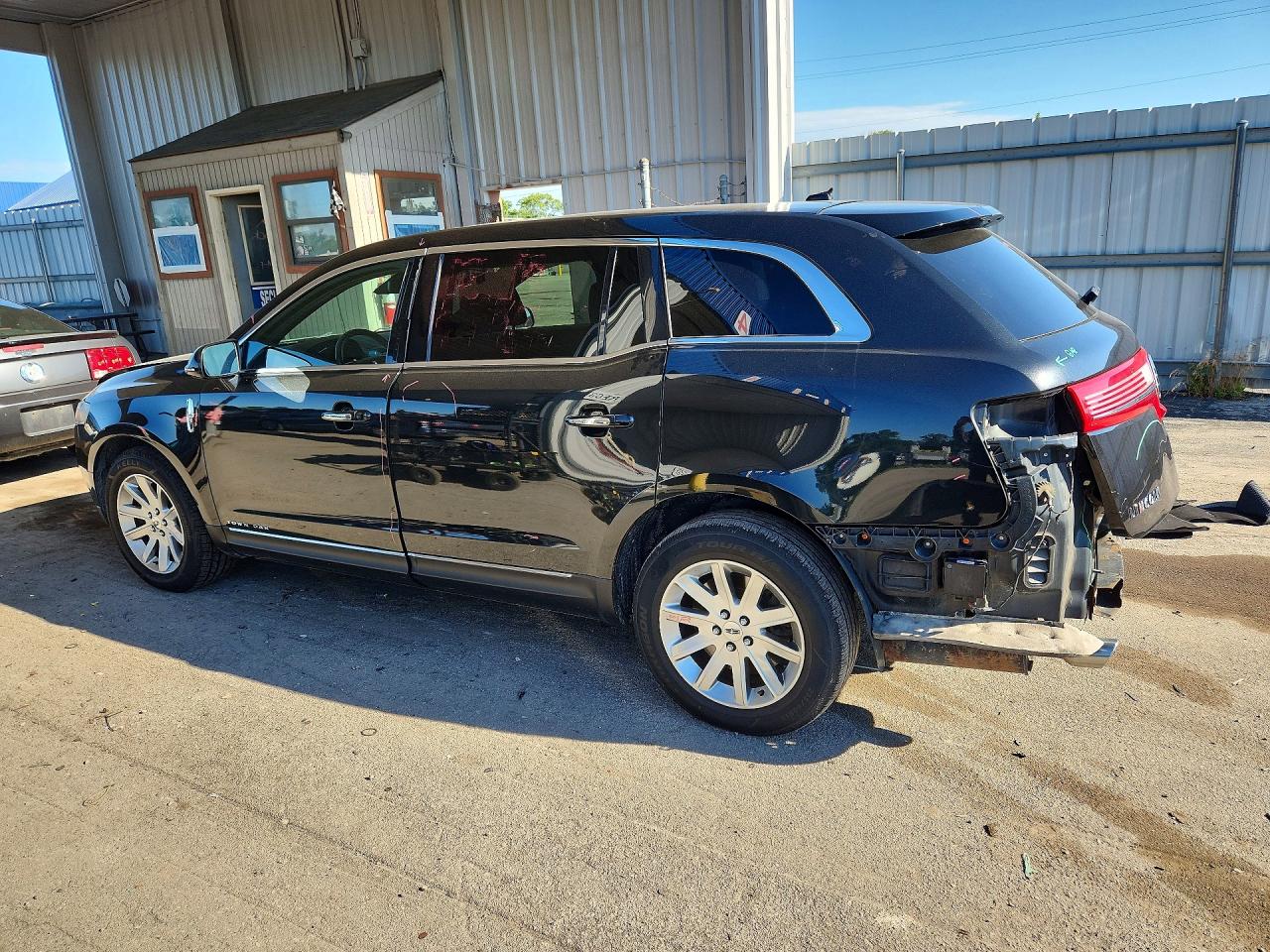 2LMHJ5NK8EBL59142 · 2014 LINCOLN MKT · 2/14