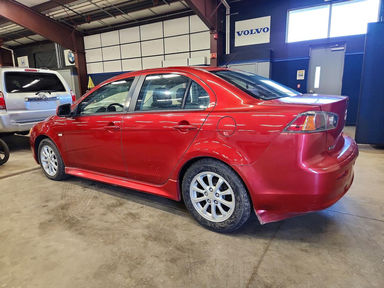 JA32U2FU7DU000576 · 2013 MITSUBISHI LANCER · 2/12