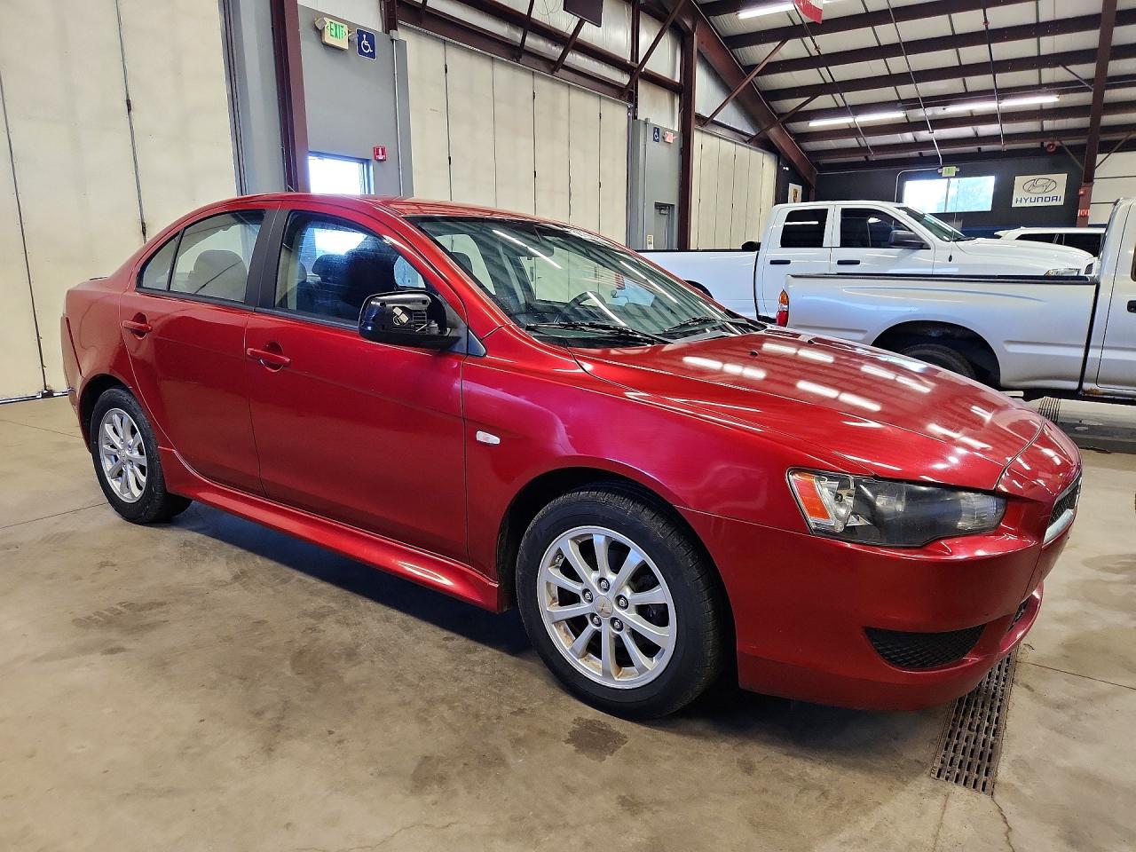 JA32U2FU7DU000576 · 2013 MITSUBISHI LANCER · 4/12