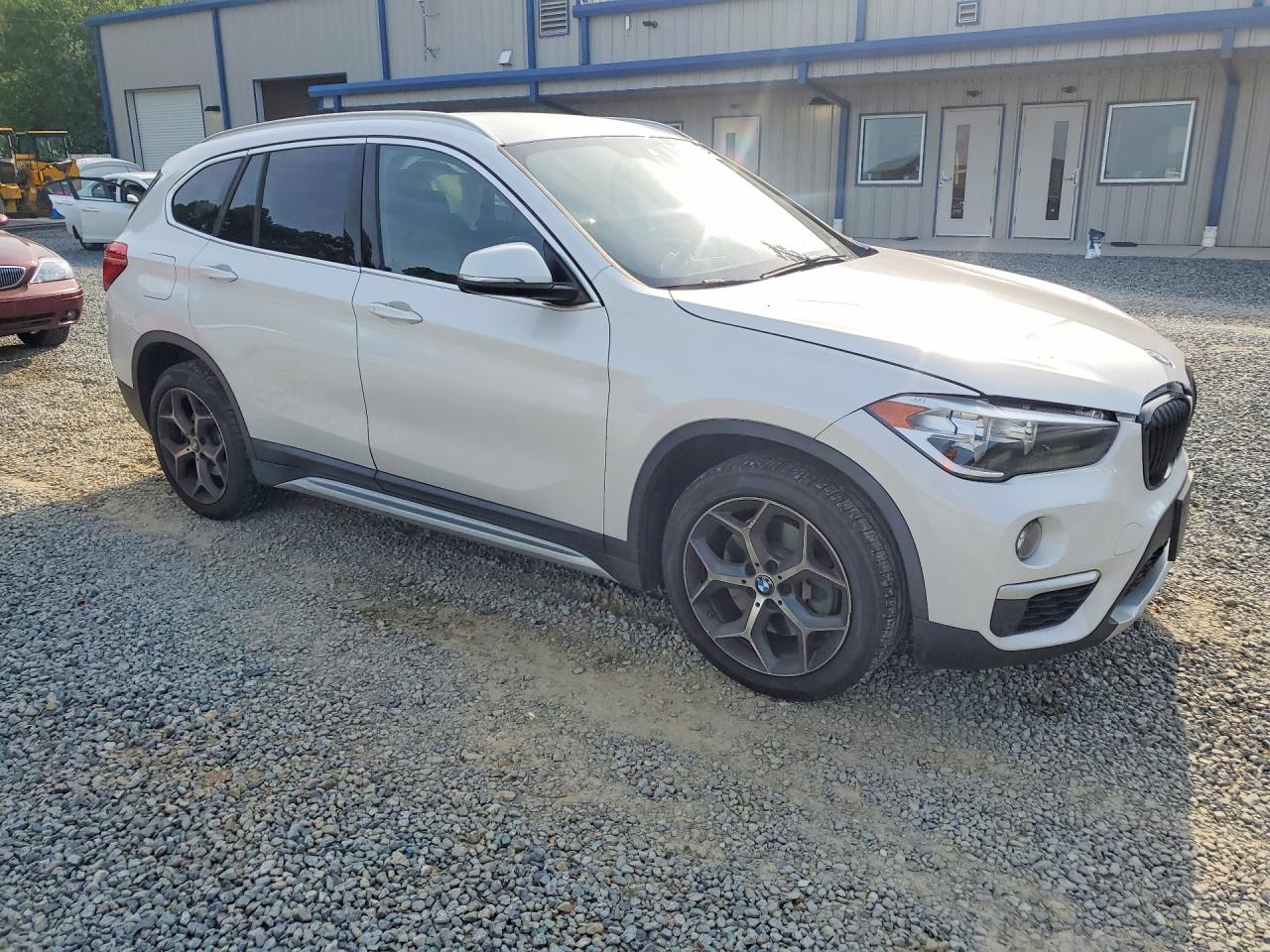 WBXHT3C54K3H35834 · 2019 BMW X1 · 4/13