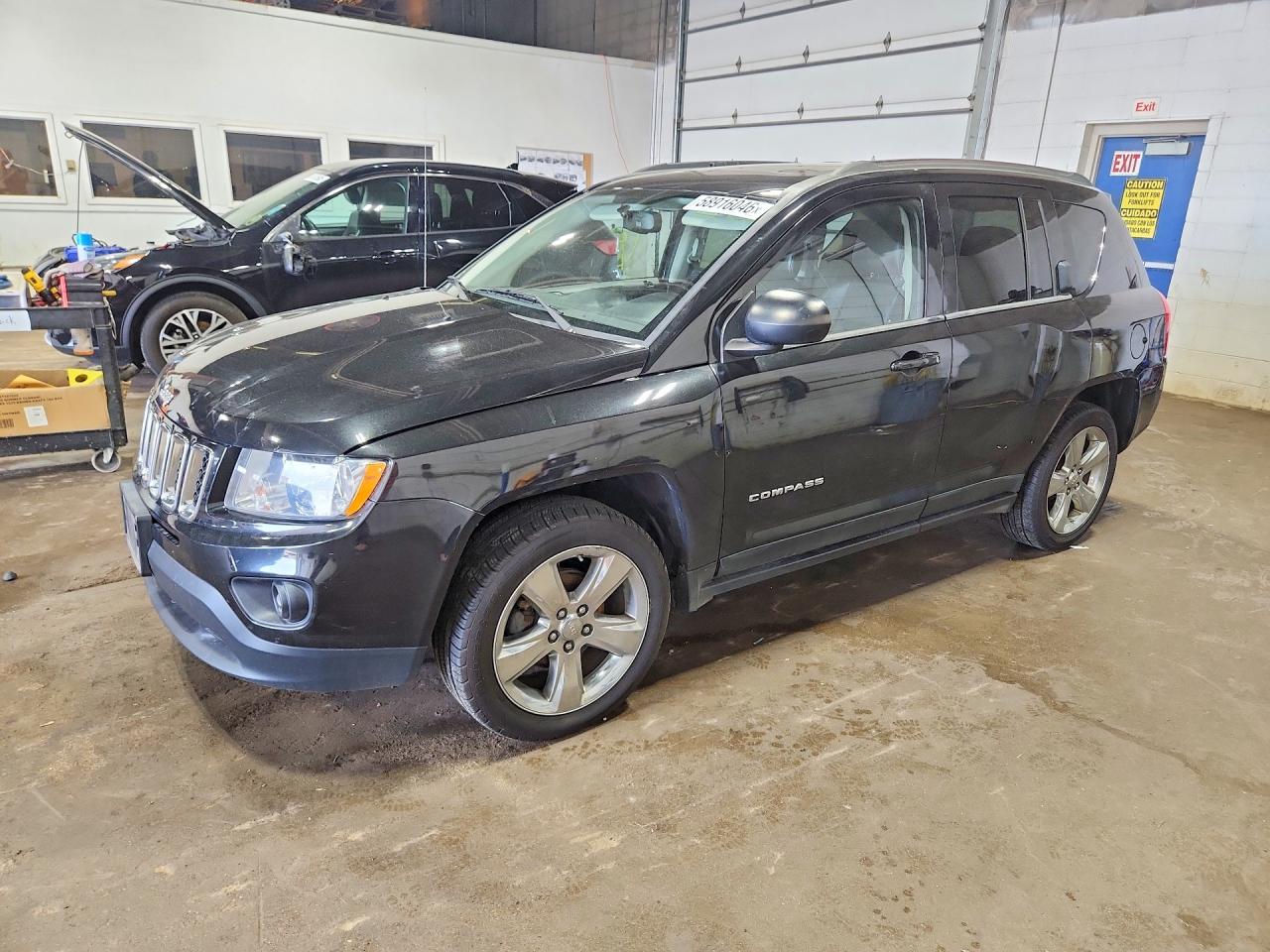1J4NF5FB7BD158335 · 2011 JEEP COMPASS