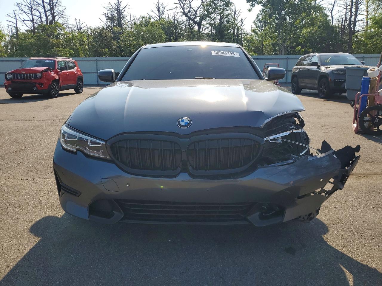 WBA5R7C56KAJ80509 · 2019 BMW 330XI · 5/11