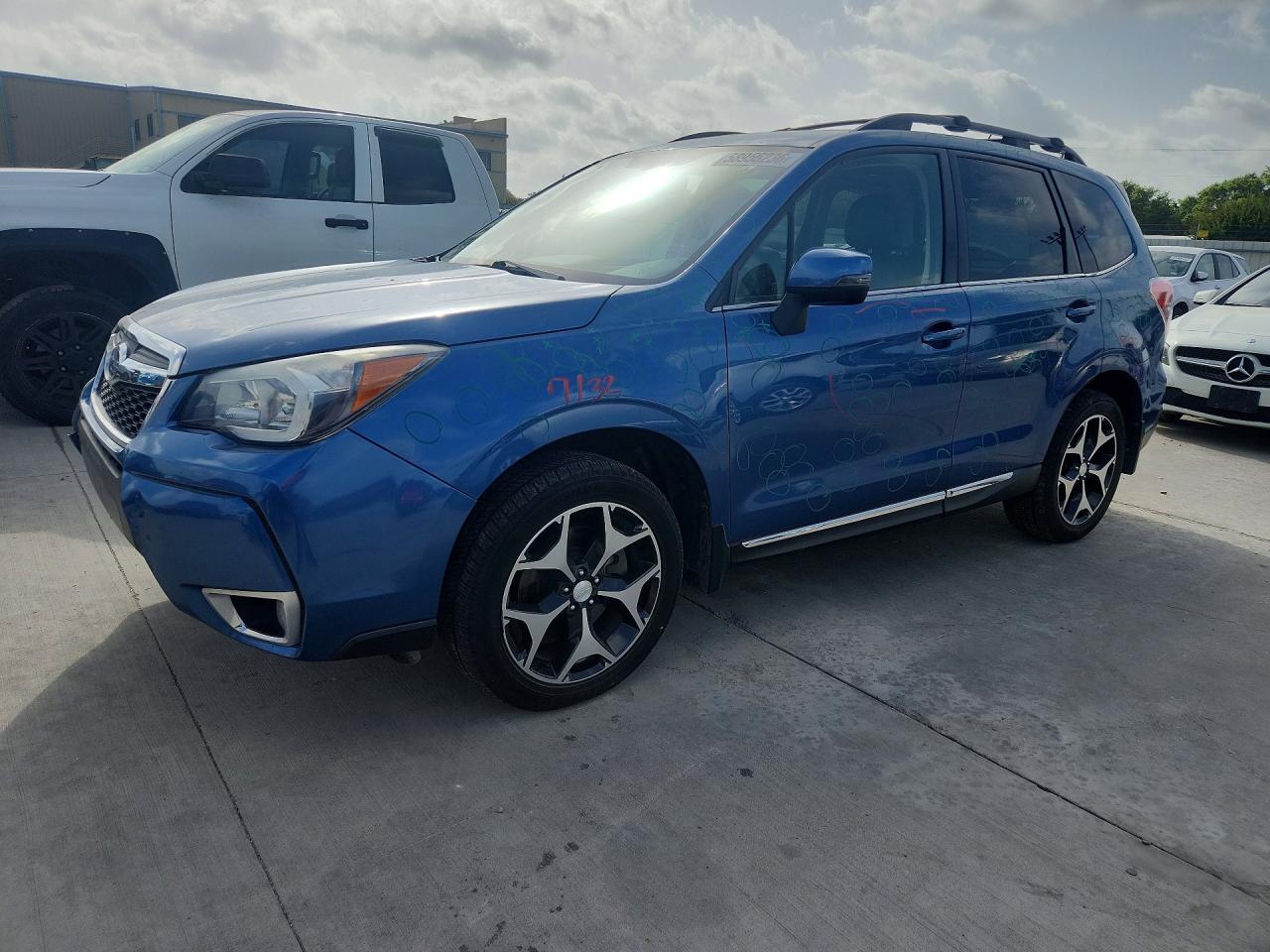 JF2SJGUC7FH554392 · 2015 SUBARU FORESTER
