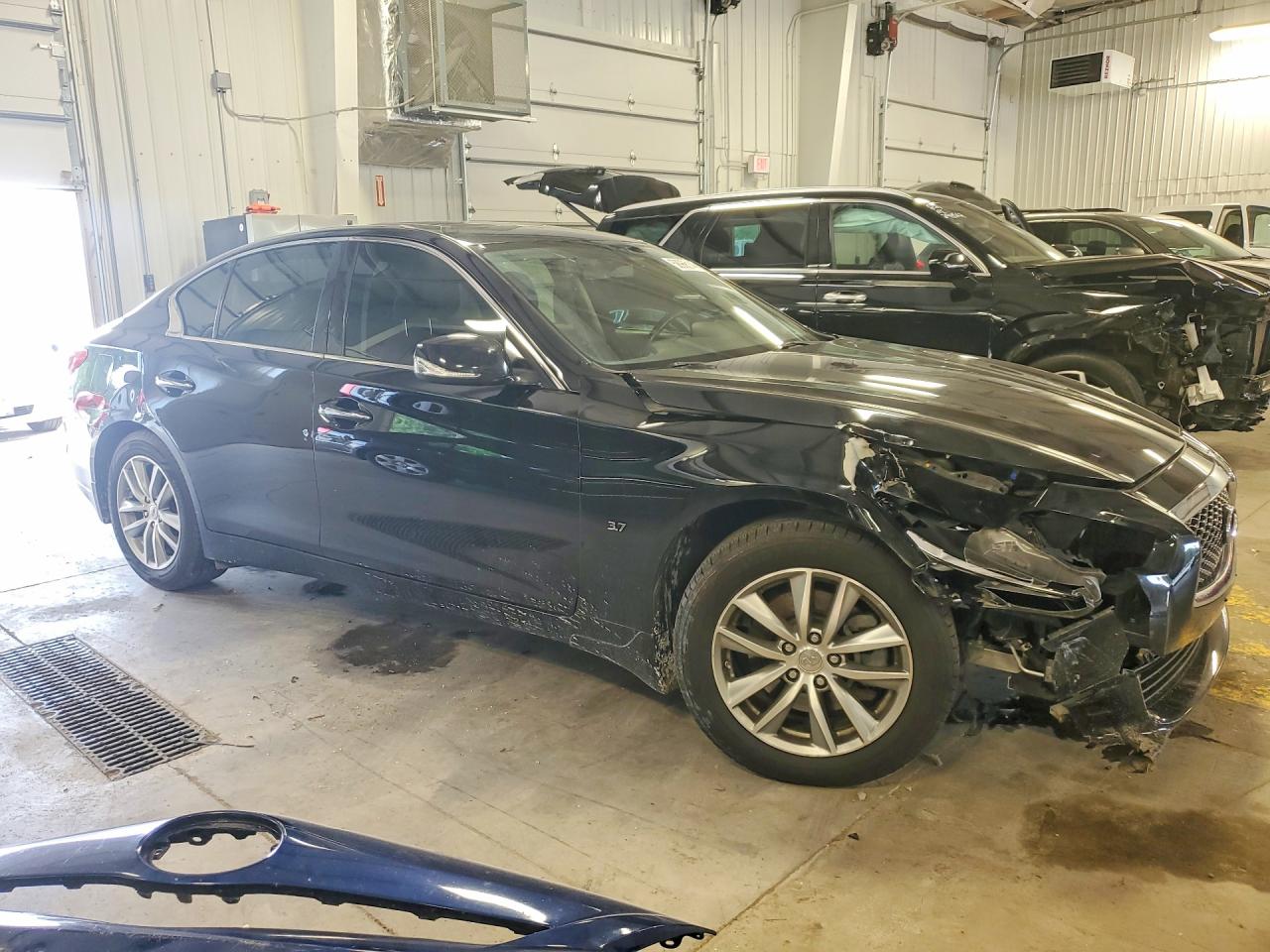 JN1BV7ARXFM415198 · 2015 INFINITI Q50 · 4/12