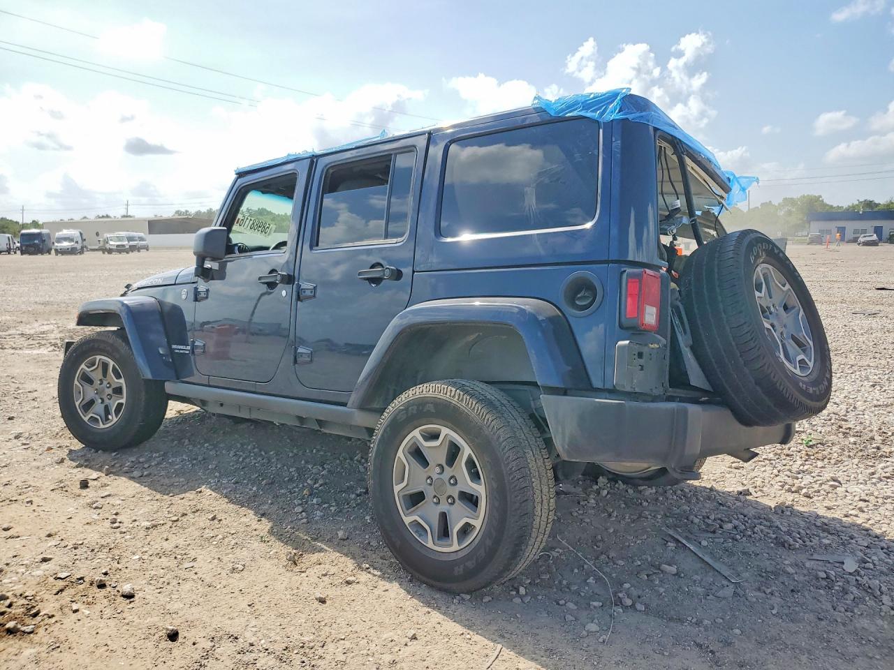 1C4BJWFG2DL584029 · 2013 JEEP WRANGLER UNLIMITED · 2/12