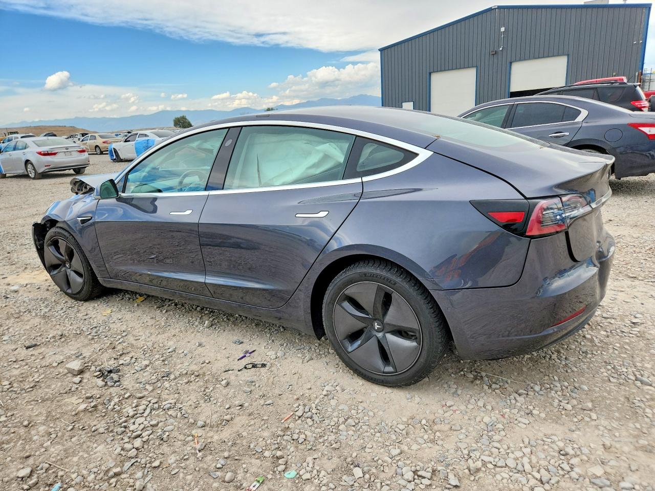 5YJ3E1EB3JF181354 · 2018 TESLA MODEL 3 · 2/12