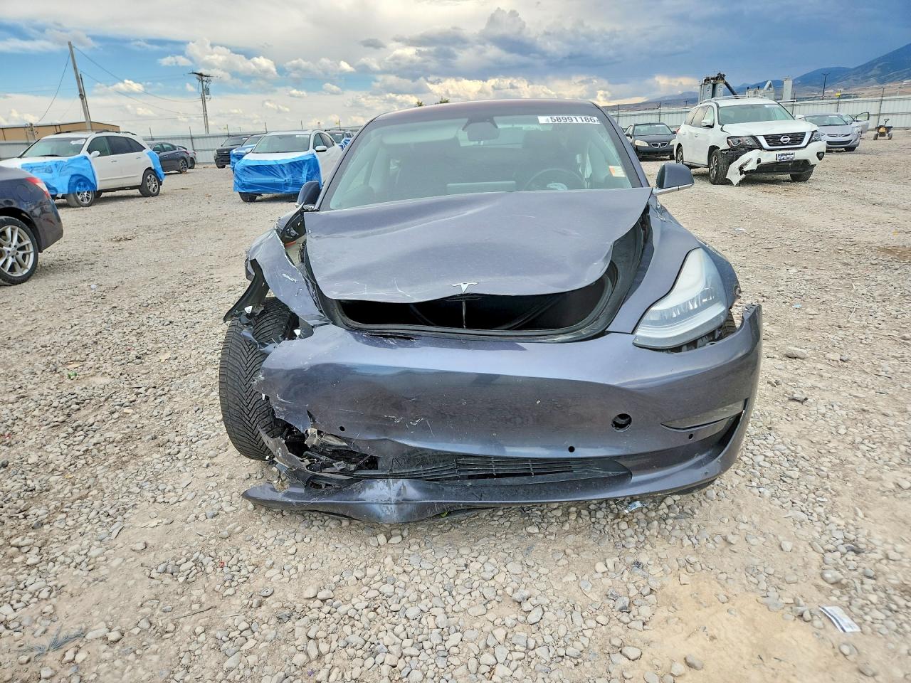 5YJ3E1EB3JF181354 · 2018 TESLA MODEL 3 · 5/12