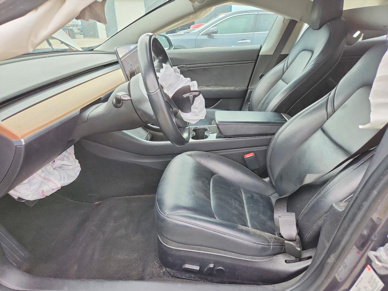 5YJ3E1EB3JF181354 · 2018 TESLA MODEL 3 · 7/12