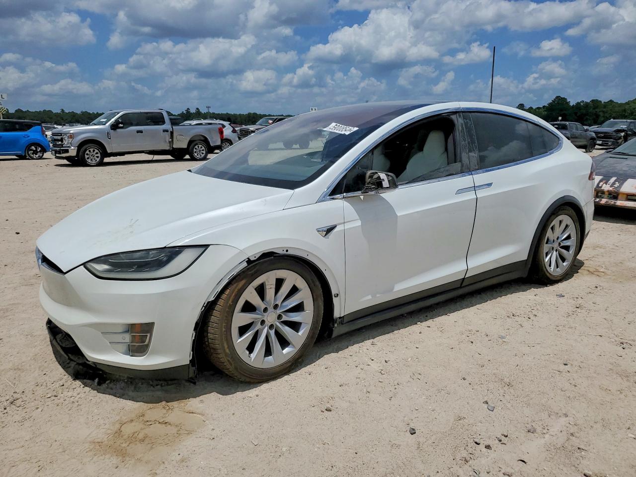 5YJXCBE28HF049634 · 2017 TESLA MODEL X