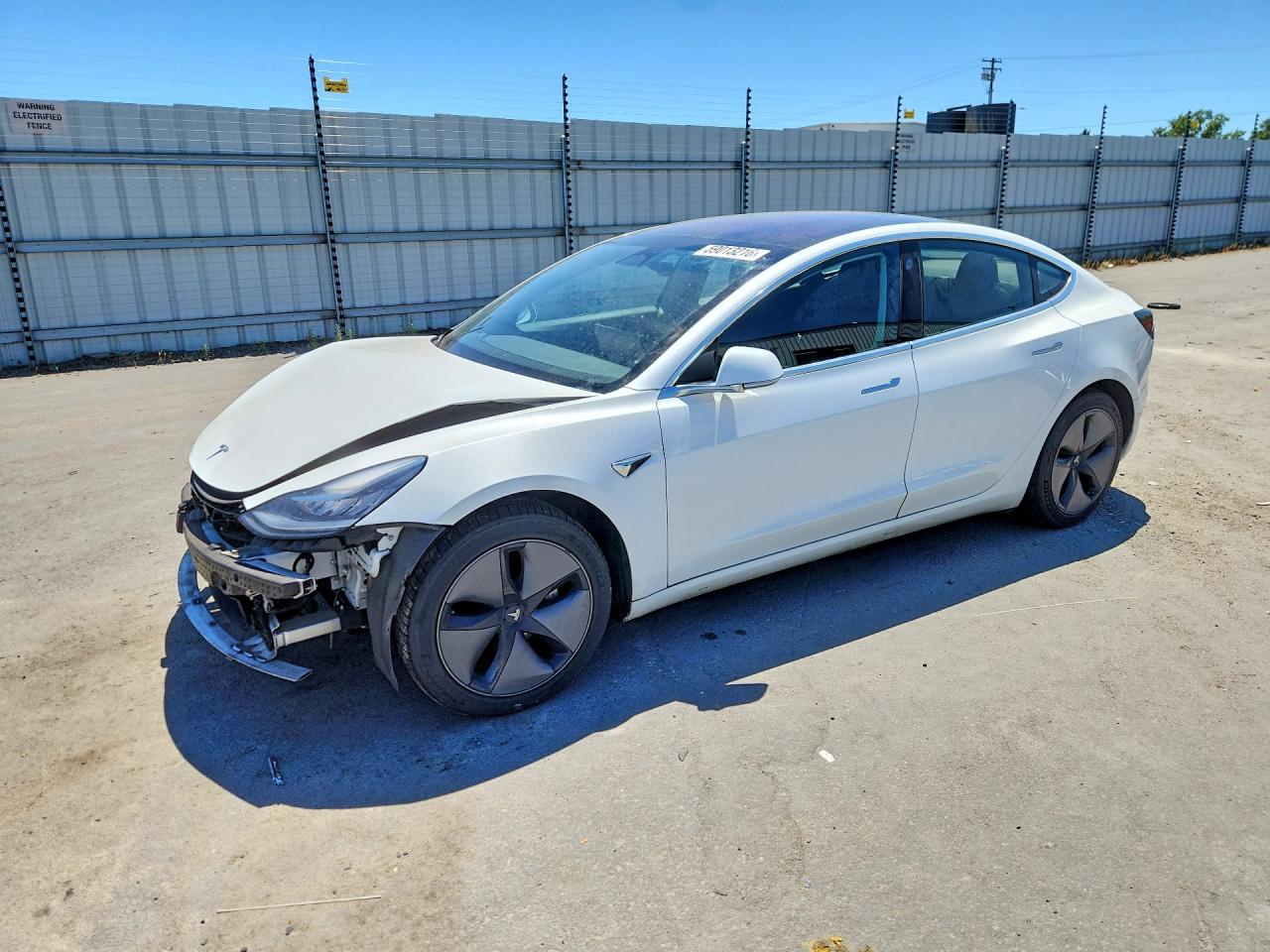 5YJ3E1EA0JF044573 · 2018 TESLA MODEL 3