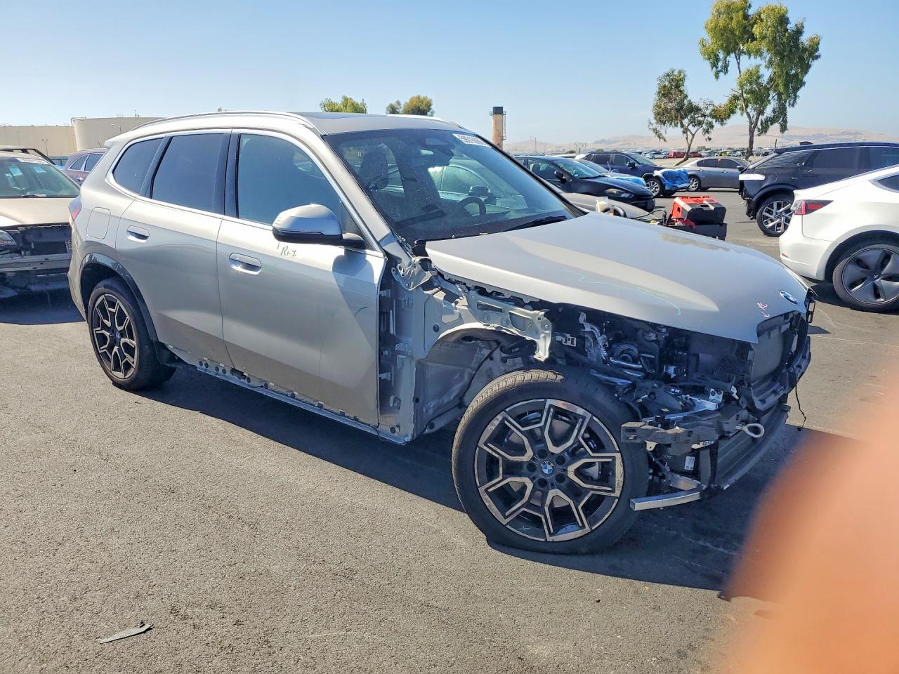 WBX73EF08T5497044 · 2026 BMW X1 · 4/14