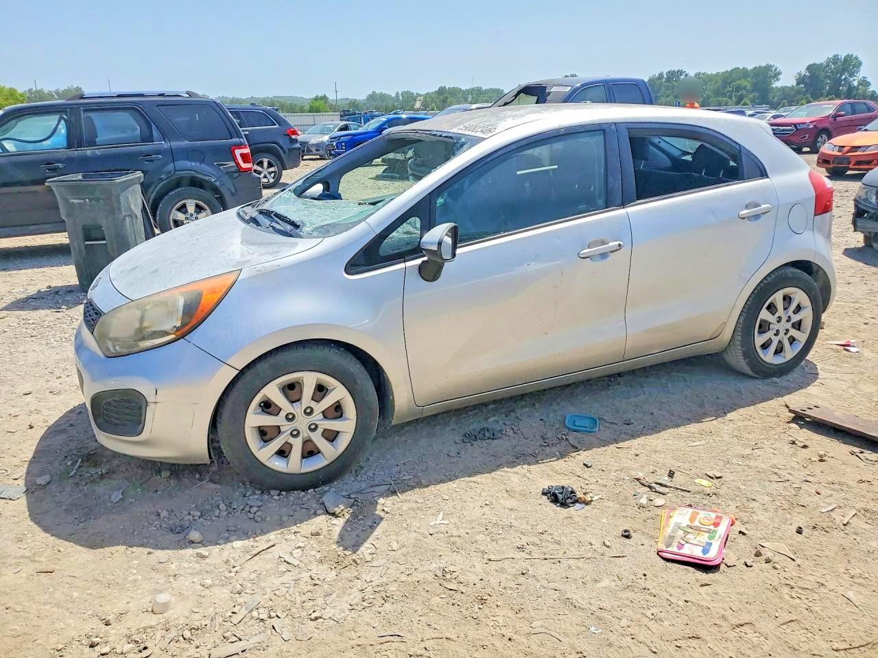 KNADM5A31C6036502 · 2012 KIA RIO