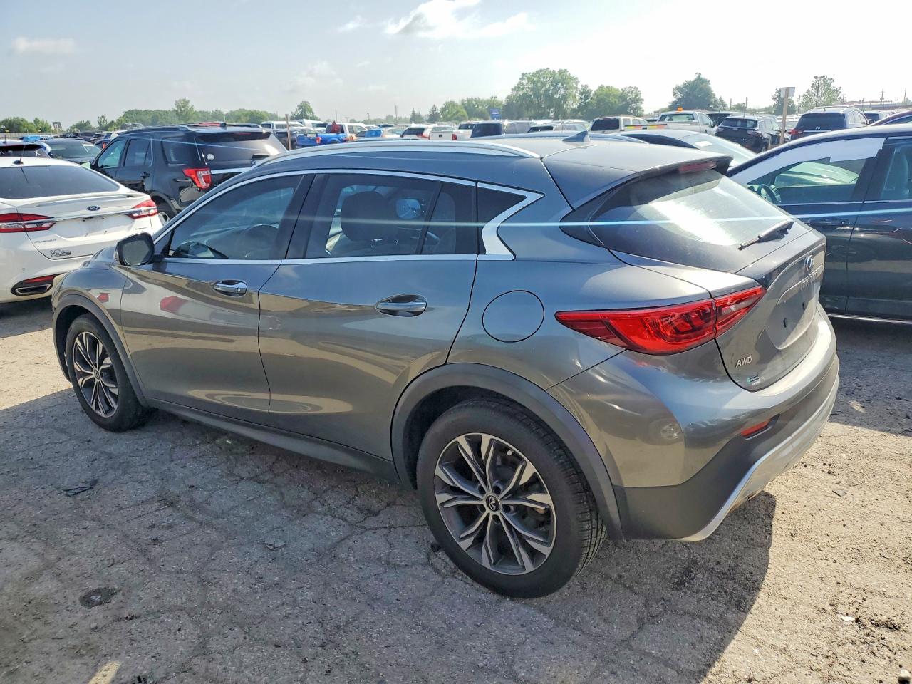 SJKCH5CR1JA043560 · 2018 INFINITI QX30 · 2/13