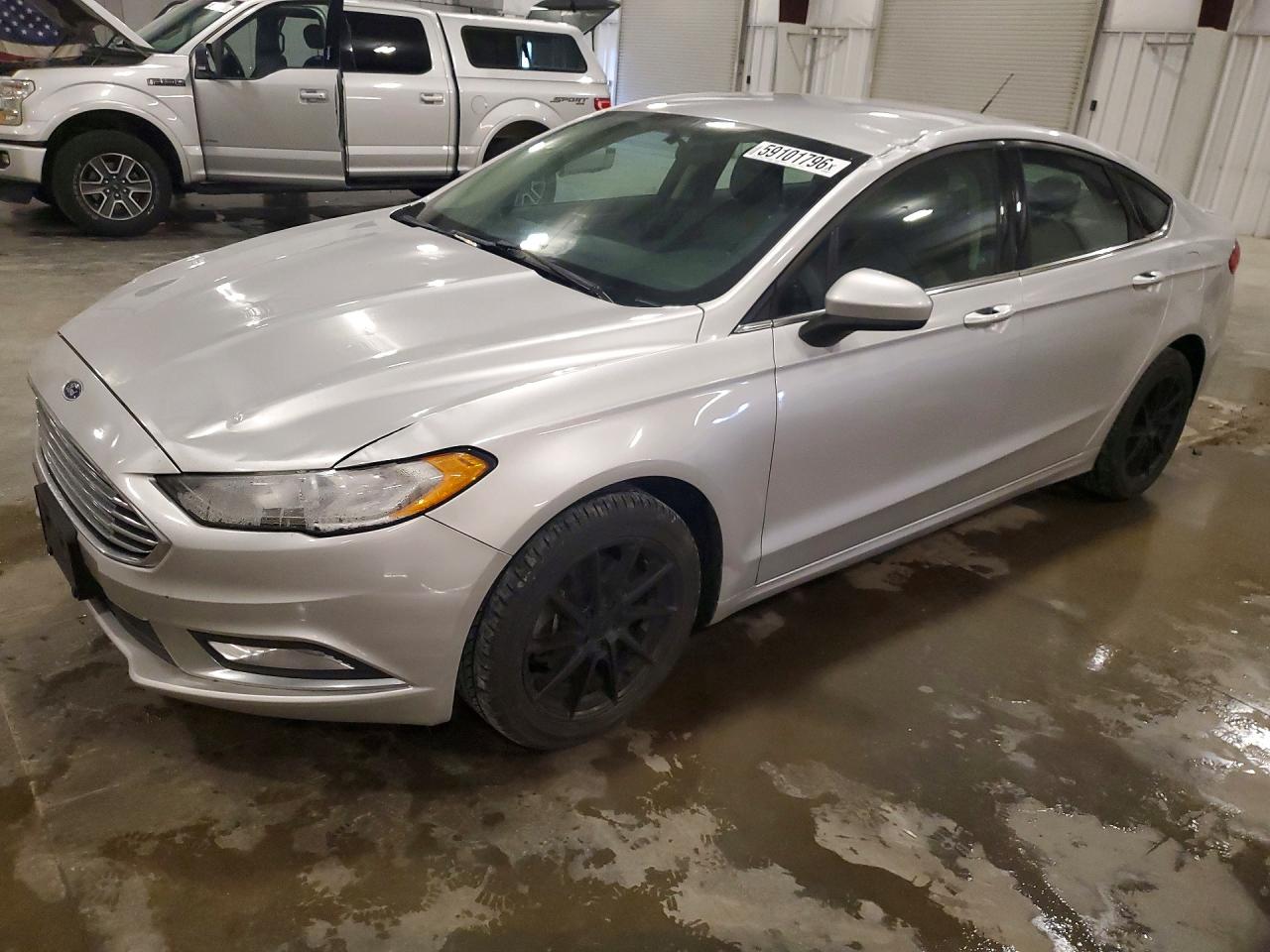 3FA6P0T97JR191651 · 2018 FORD FUSION