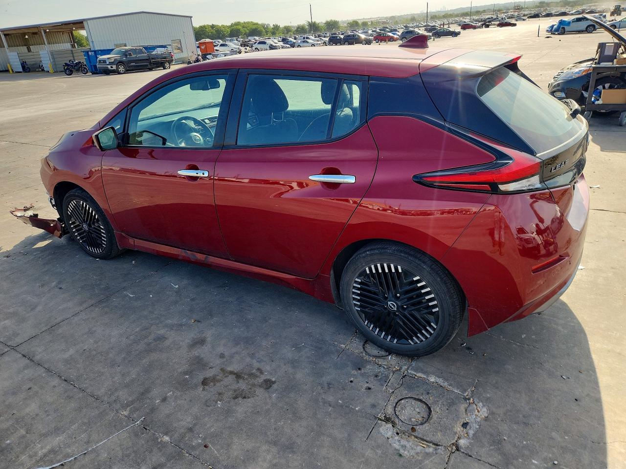 1N4CZ1CV2PC557619 · 2023 NISSAN LEAF · 2/12