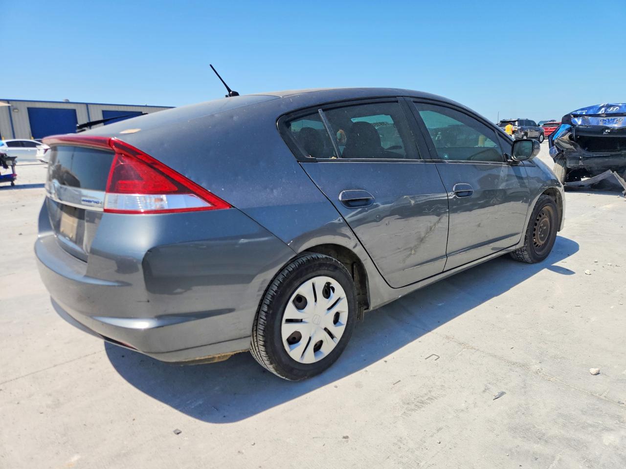JHMZE2H30CS003877 · 2012 HONDA INSIGHT · 3/12