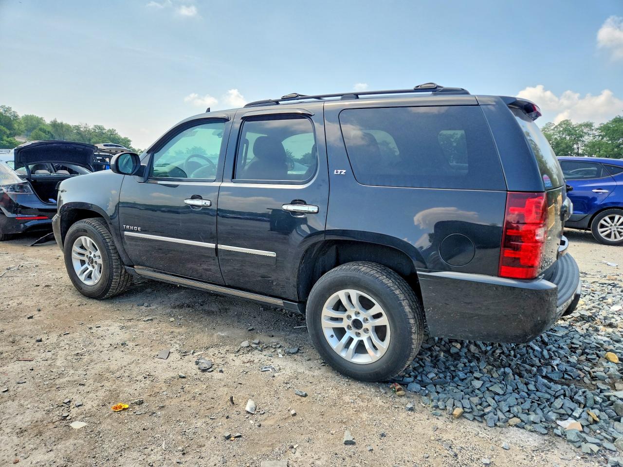 1GNSKCE02CR209373 · 2012 CHEVROLET TAHOE · 2/13