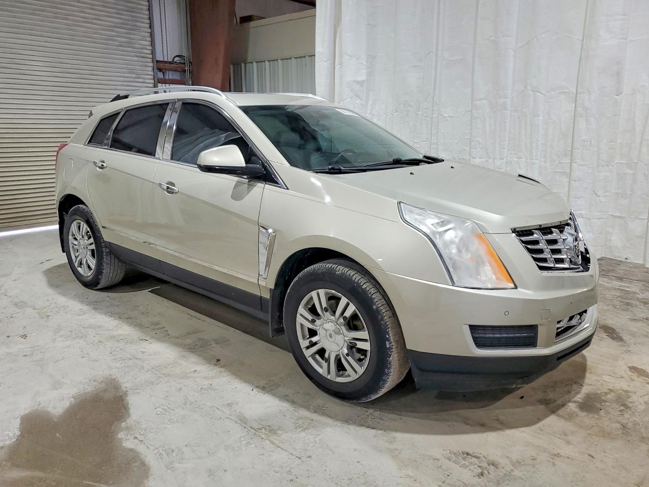 3GYFNBE3XES657554 · 2014 CADILLAC SRX · 4/13