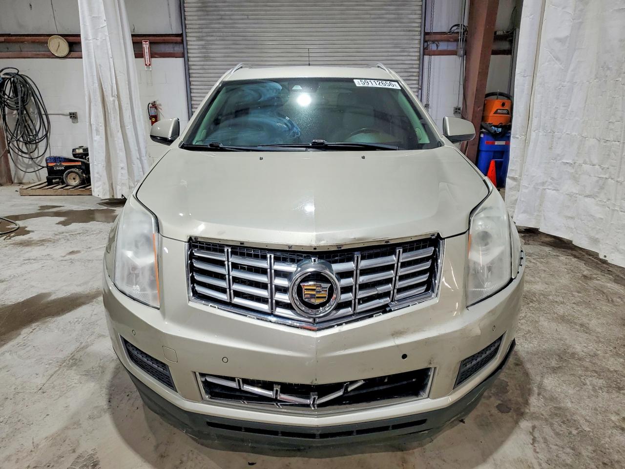 3GYFNBE3XES657554 · 2014 CADILLAC SRX · 5/13