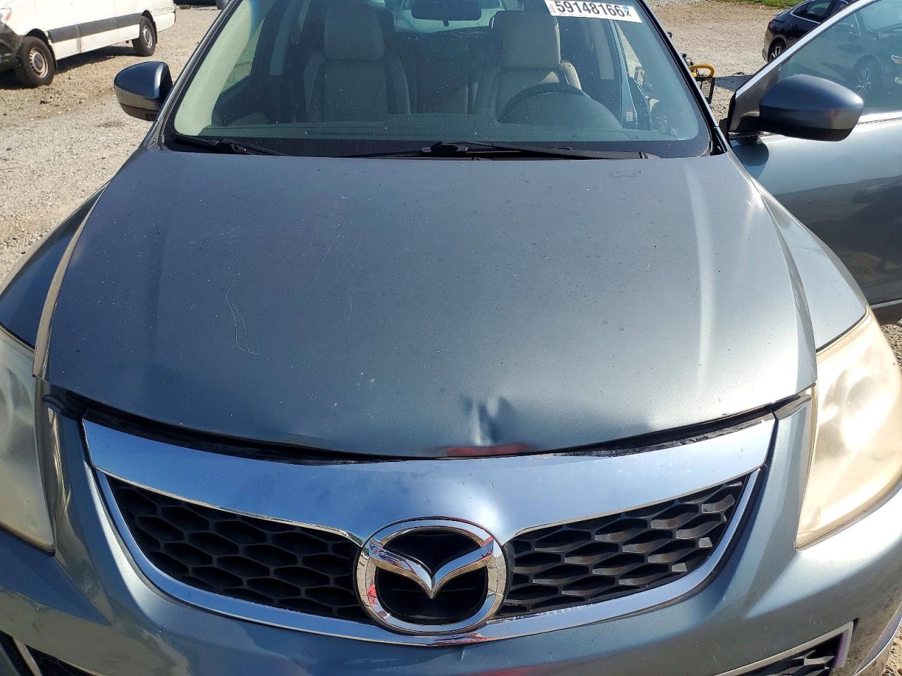 JM3TB2CA7B0318666 · 2011 MAZDA CX-9 · 11/12