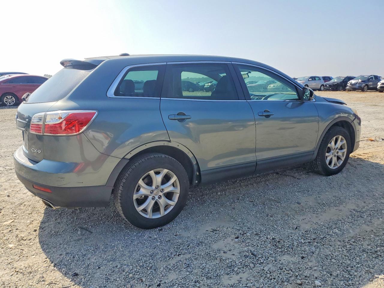 JM3TB2CA7B0318666 · 2011 MAZDA CX-9 · 3/12