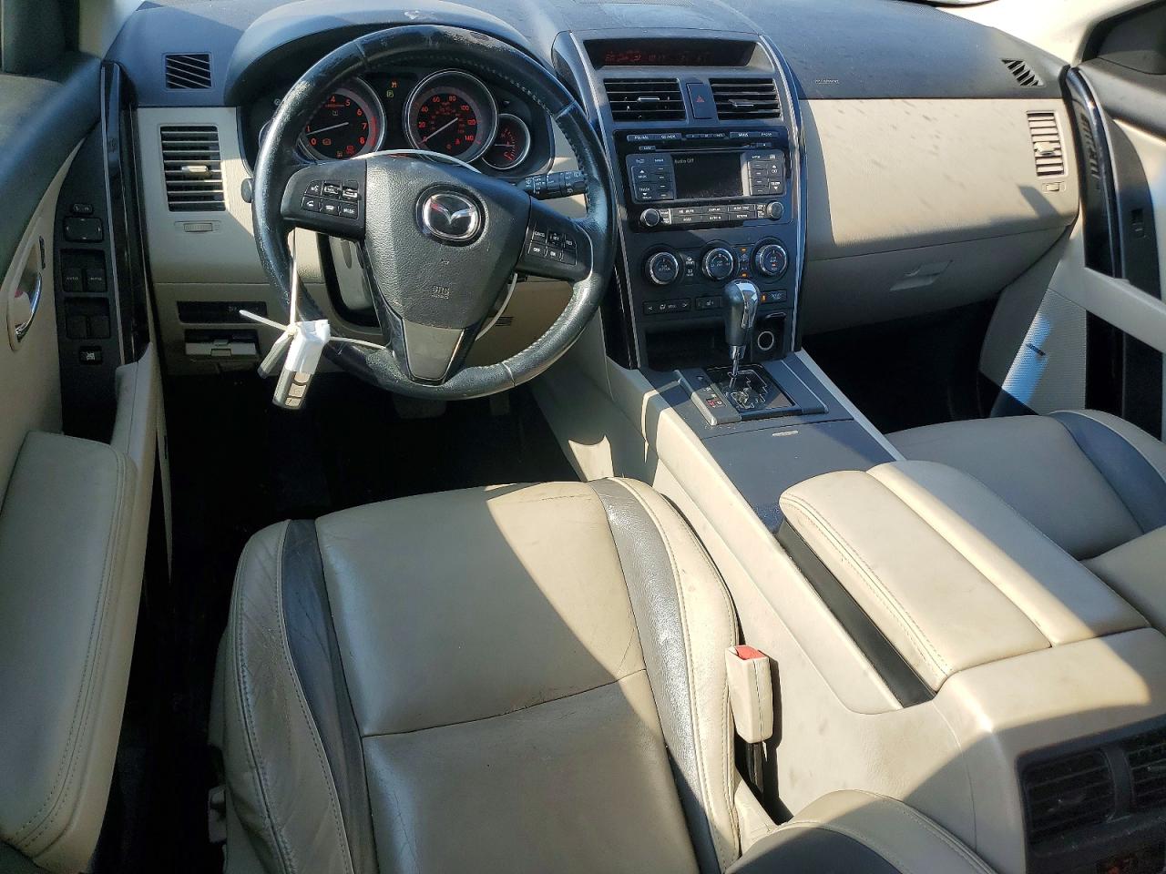 JM3TB2CA7B0318666 · 2011 MAZDA CX-9 · 8/12