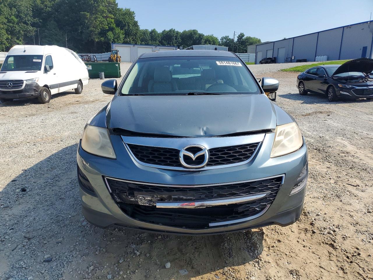 JM3TB2CA7B0318666 · 2011 MAZDA CX-9 · 5/12