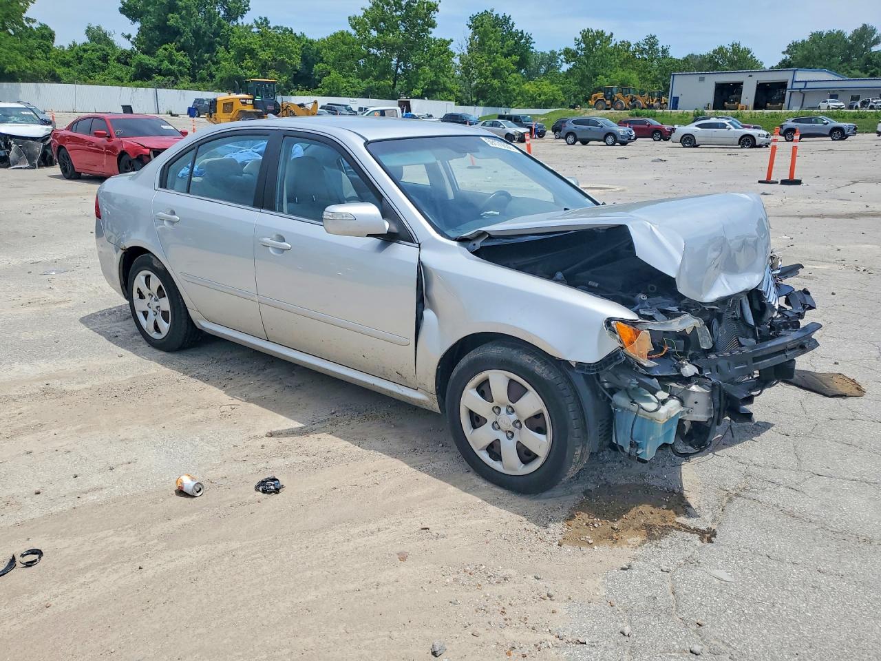 KNAGE228495321454 · 2009 KIA OPTIMA · 4/12