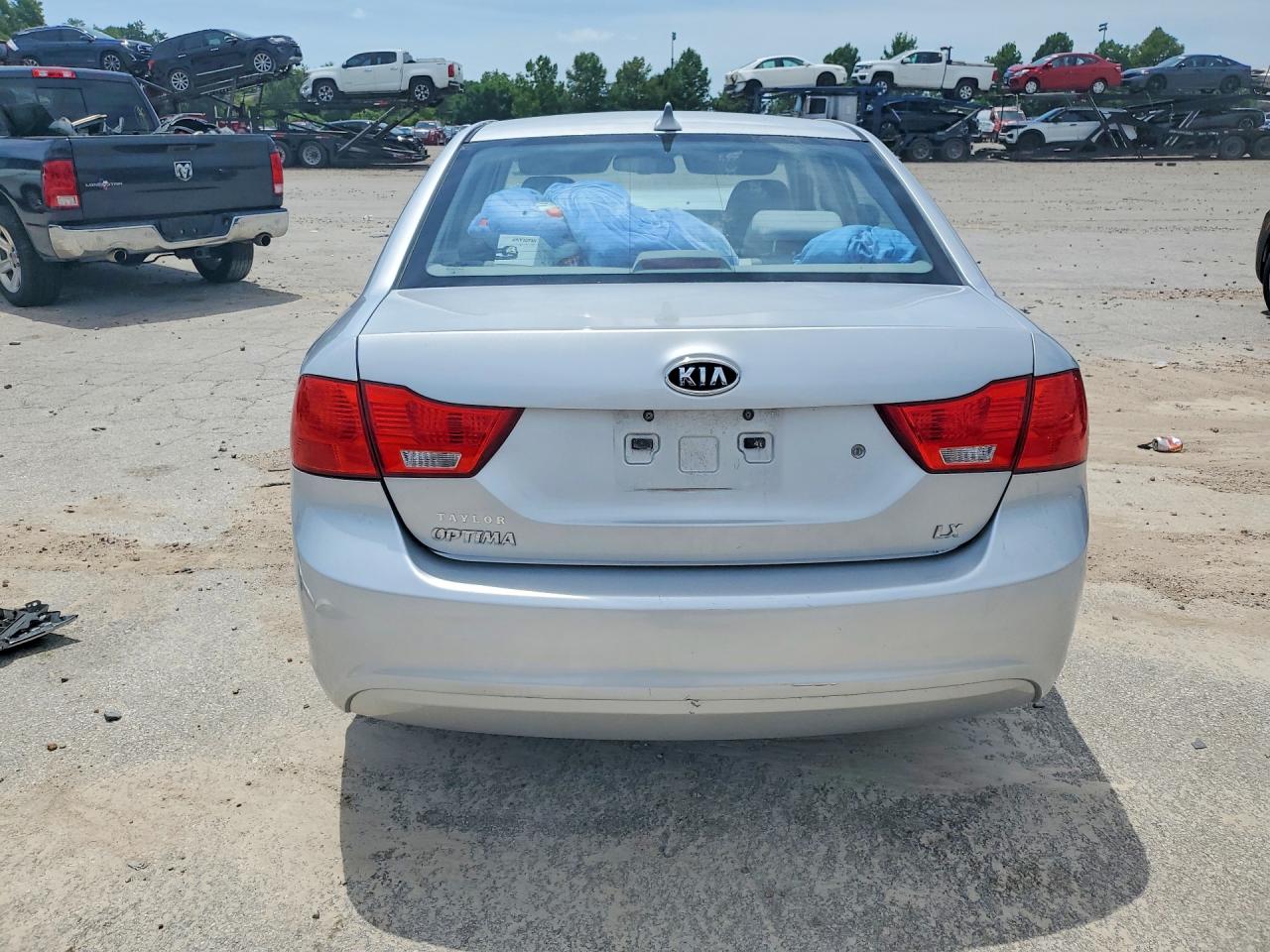 KNAGE228495321454 · 2009 KIA OPTIMA · 6/12